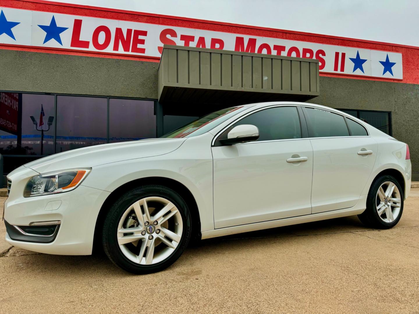 2015 WHITE VOLVO S60 PREMIER PLUS (YV140MFC3F1) , located at 5900 E. Lancaster Ave., Fort Worth, TX, 76112, (817) 457-5456, 0.000000, 0.000000 - This is a 2015 VOLVO S60 PREMIER PLUS 4 DOOR SEDAN that is in excellent condition. There are no dents or scratches. The interior is clean with no rips or tears or stains. All power windows, door locks and seats. Ice cold AC for those hot Texas summer days. It is equipped with a CD player, AM/FM radi - Photo#1